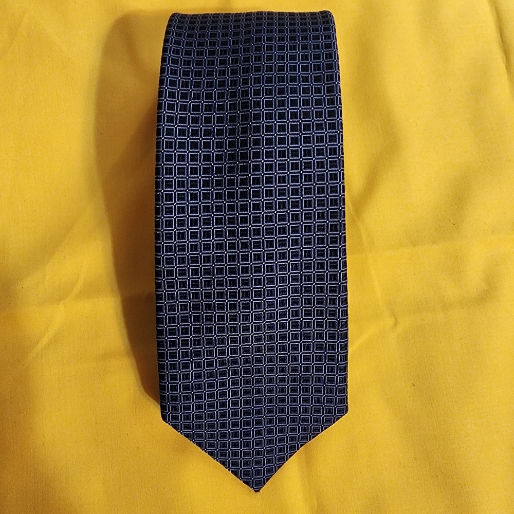 Vintage, no label, no materials tie.  Black, 60x3.5 in
